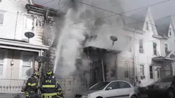 Pottsville, PA, firefighters contained a two-alarm blaze to a single home and kept flames spreading through the 12-house block Monday.
