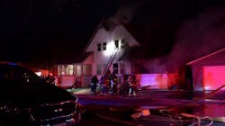 A Rock Island, IL, firefighter was injured in a fall while battling a blaze at a duplex early Monday.