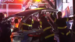 A gray sedan crashed into an ambulance sitting at a stop light on San Antonio's north side Wednesday, injuring both drivers and an elderly patie