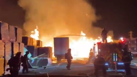 Dozens of Alameda County, CA, firefighters battled a fast-moving blaze that tore through a San Leandro paper plant late Sunday and early Monday.