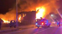 St. Louis firefighters battle a blaze that erupted at an unoccupied two-story warehouse early Thursday.