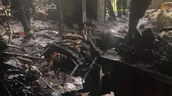 A Camden-Wyoming, DE, firefighter was rescued by his deputy chief, his chief and another firefighter after becoming trapped in a hole in the floor of a burning home last month.