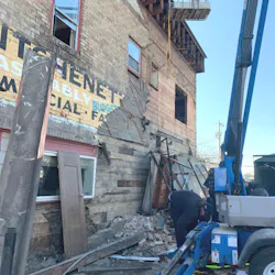 Spokane, WA, firefighters rescued two workers from debris following a walkway collapse at a construction site Monday.