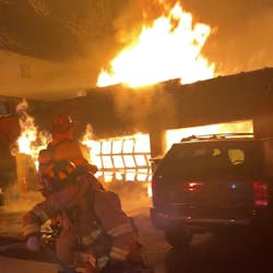 A Stamford, CT, firefighter suffered minor injuries while battling a blaze that broke out at a large garage early Sunday.
