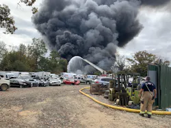 Firefighters work to extinguish a fire at Auto Parts U Pull & Scrap Metal in Shelby on Saturday. Firefighters work to extinguish a fire at Auto Parts U Pull & Scrap Metal in Shelby on Saturday.