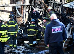 Invesigators work scene of deadly overnight fire in Paterson on Sunday. Invesigators work scene of deadly overnight fire in Paterson on Sunday.
