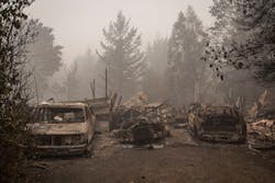 Remains of a home and vehicles burned by the Beachie Creek Fire in Gates, OR, on Sept. 13, 2020. Remains of a home and vehicles burned by the Beachie Creek Fire in Gates, OR, on Sept. 13, 2020.