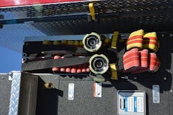 Each of the Howard County clean cab pumpers have a decontamination shower on the right-side pump panel. Note the shoulder-loaded 1¾-inch crosslay attack lines with the pump piping extended to the panel. This permits rapid deployment for extending attack lines. Each of the Howard County clean cab pumpers have a decontamination shower on the right-side pump panel. Note the shoulder-loaded 1¾-inch crosslay attack lines with the pump piping extended to the panel. This permits rapid deployment for extending attack lines.