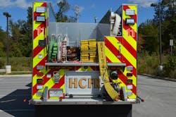 A 2019 Spartan Metro Star pumper, which is equipped with a 1,500-gpm pump, 750-gallon water tank and 30-gallon foam cell, has an L-shaped water tank to provide a rear hosebed height of approximately 60 inches from the ground. Note the low-mounted ground ladder compartment on the right side of the body. A 2019 Spartan Metro Star pumper, which is equipped with a 1,500-gpm pump, 750-gallon water tank and 30-gallon foam cell, has an L-shaped water tank to provide a rear hosebed height of approximately 60 inches from the ground. Note the low-mounted ground ladder compartment on the right side of the body.