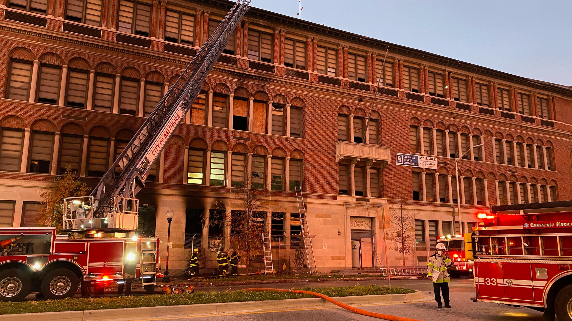 Two people were rescued by Baltimore City firefighters from a two-alarm fire that damaged part of the old Sojourner Douglass College building early Wednesday.