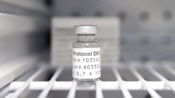 A sterile vial of AstraZeneca Phase III trial COVID-19 vaccine sits in a refrigerator at the Prism Health North Texas location in Oak Cliff on Thursday. The clinic administers the vaccine to non-COVID patients participating in the trial study.