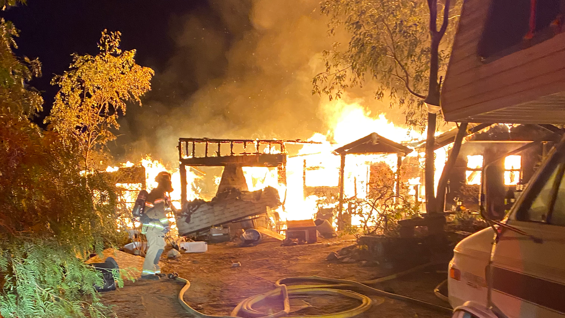 CAL FIRE firefighters battled a fire that destroyed a house and displaced two people north of Campo on Wednesday.
