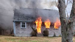 Dartmouth, MA, Fire District 2 firefighters rescued an unconscious woman from a burning two-story home Monday. Dartmouth, MA, Fire District 2 firefighters rescued an unconscious woman from a burning two-story home Monday.