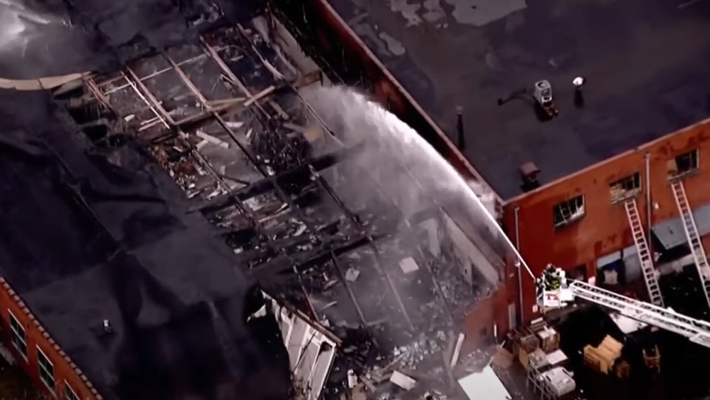 Englewood, NJ, firefighters battled a five-alarm blaze that ripped through a building Wednesday.