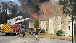 A mother dropped her two children out of a third-story window to escape a burning apartment in Irmo, SC, on Wednesday. A mother dropped her two children out of a third-story window to escape a burning apartment in Irmo, SC, on Wednesday.