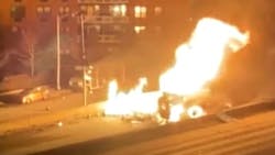 FDNY firefighters battled a two-alarm fire that erupted early Tuesday when a flatbed truck hauling propane tanks overturned along the Long Island Expressway in Queens. FDNY firefighters battled a two-alarm fire that erupted early Tuesday when a flatbed truck hauling propane tanks overturned along the Long Island Expressway in Queens.