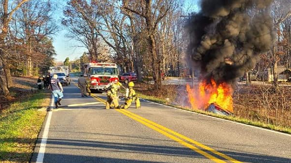 An off-duty Lynchburg, VA, firefighter saved an elderly couple from a burning car on the side of the road in Appomattox Count on Sunday.