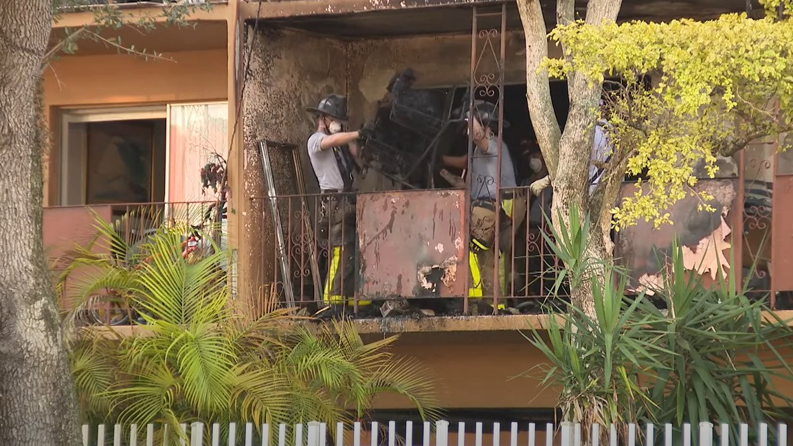 More than 90 Miami-Dade firefighters battled a fire that broke out at a North Miami apartment building and injured four people Saturday.