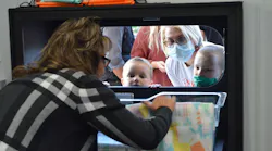 Monica Kelsey demonstrates how the Safe Haven Baby Box at the newly built fire and police building in Ocala, FL, on Tuesday.