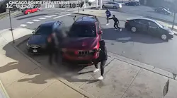 Police released a video showing Dwain Williams, 65, trying to fend off three men during an attempted carjacking that claimed the retired Chicago firefighter's life.