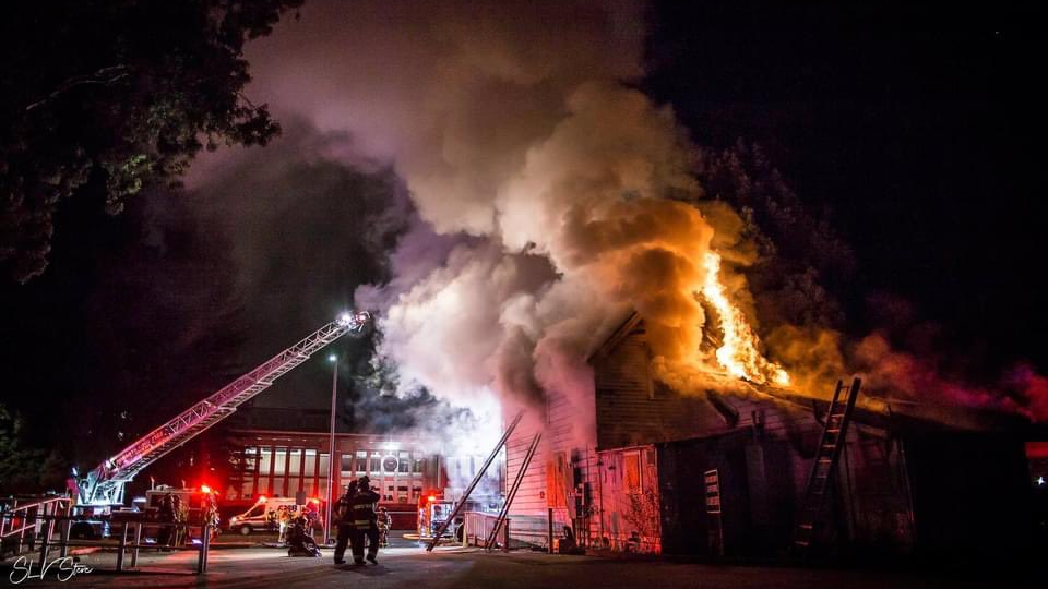A Santa Cruz, CA, firefighter and a civilian were injured when a boarded-up, former recovery center building caught fire early Wednesday, killing one person.