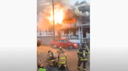Fireworks explode during a residential fire in Seltzer, PA, on Friday.