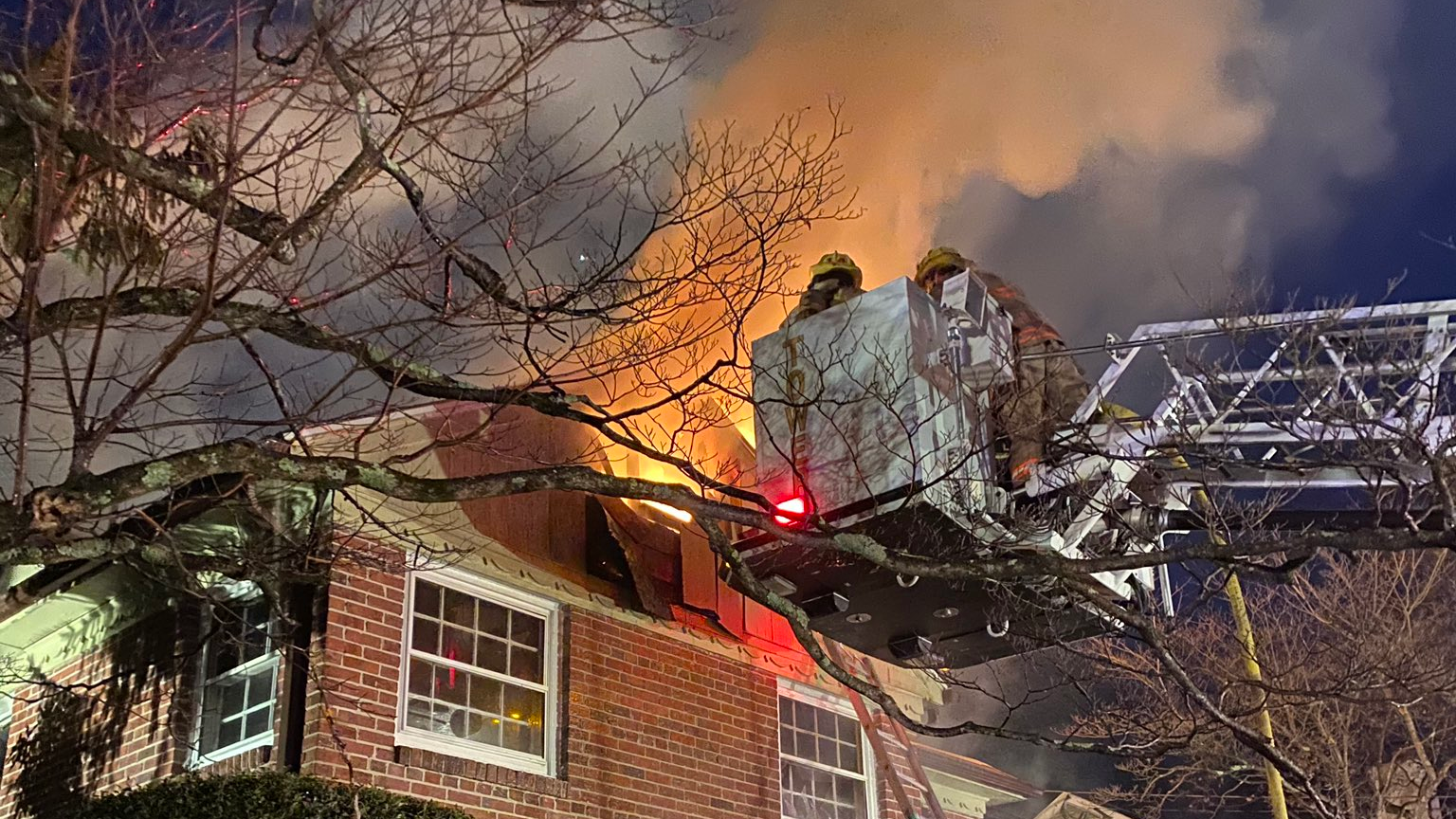 Around 60 Montgomery County, MD, firefighters battled a massive fire that broke out at an unoccupied house in Silver Spring early Tuesday.
