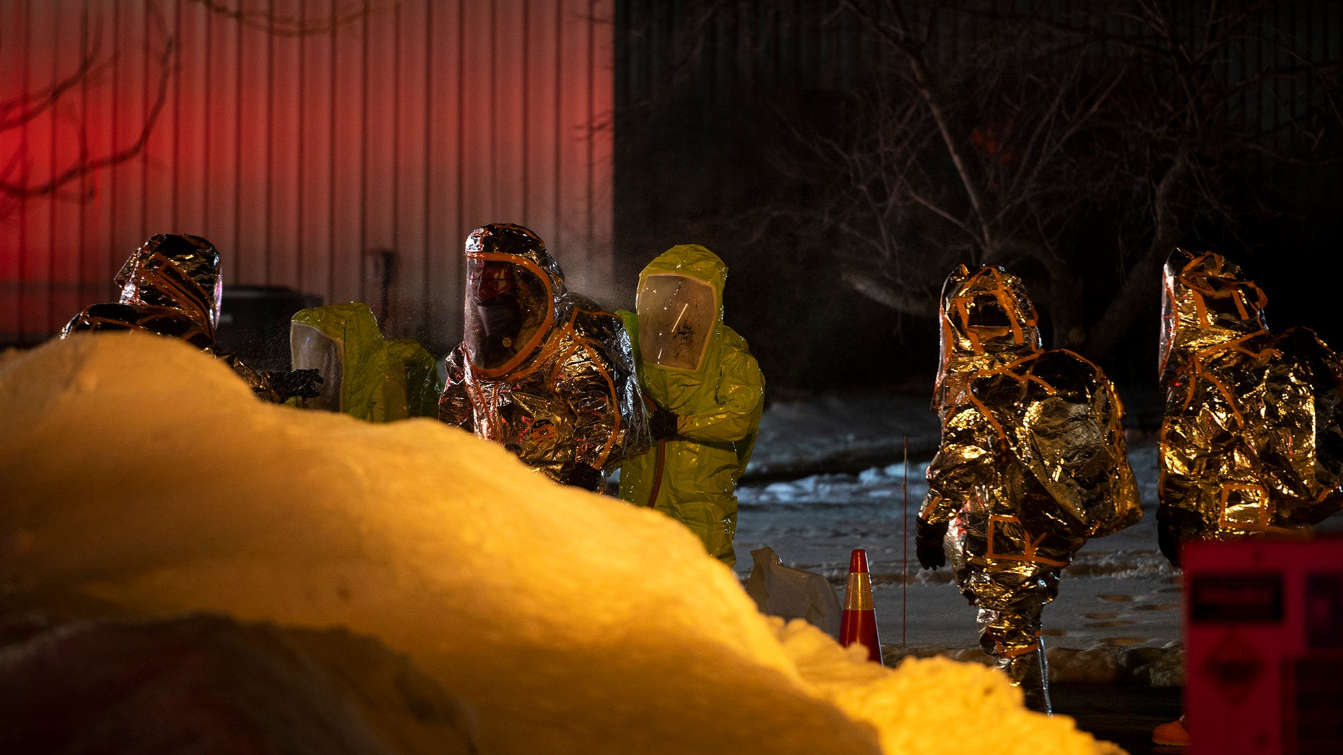 Hazmat crews work to clean up a nitric acid spill that occurred from a truck at Rafferty Aluminum & Steel in Sterling, MA, on Tuesday.