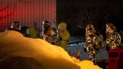 Hazmat crews work to clean up a nitric acid spill that occurred from a truck at Rafferty Aluminum & Steel in Sterling, MA, on Tuesday. Hazmat crews work to clean up a nitric acid spill that occurred from a truck at Rafferty Aluminum & Steel in Sterling, MA, on Tuesday.