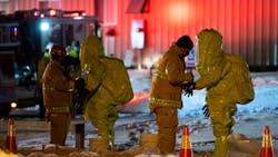 Hazmat crews work to clean up a nitric acid spill that occurred from a truck at Rafferty Aluminum & Steel in Sterling, MA, on Tuesday. Hazmat crews work to clean up a nitric acid spill that occurred from a truck at Rafferty Aluminum & Steel in Sterling, MA, on Tuesday.