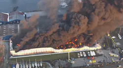 Firefighters from multiple departments battled the massive blaze that erupted at the Toledo Beach Marina in LaSalle, MI, early Friday.