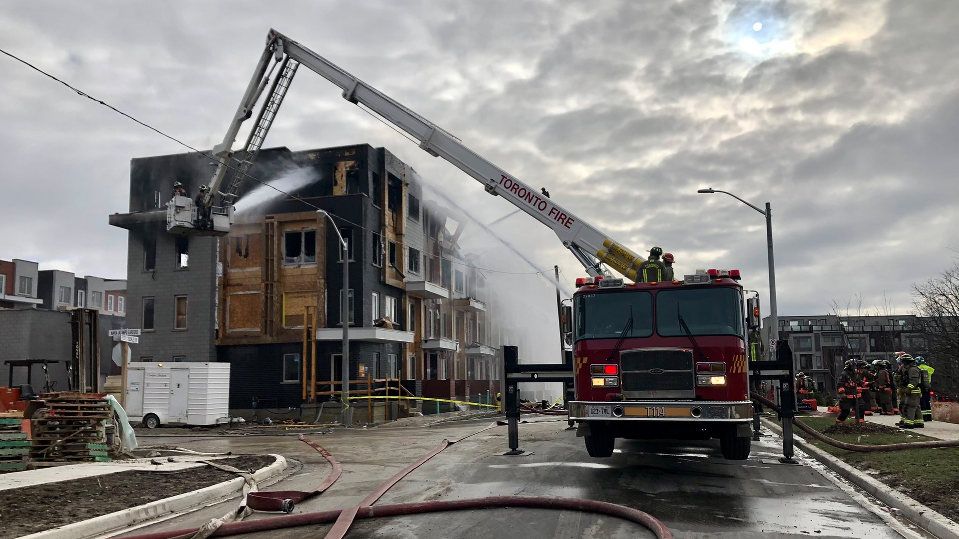 Toronto firefighters battled a difficult three-alarm fire for nearly three hours Saturday, and the blaze damaged several vacant townhouses near the city's Downsview Park/