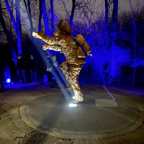 The 'Ladder of Light' sculpture was unveiled Tuesday on the 50th anniversary of the apparatus crash that killed three Naperville, IL, firefighters.