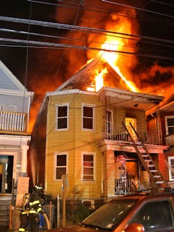When a fire that involved a boarded-up two-and-a-half-story extended to exposures on both sides, the incident action plan (IAP) had to be revised quickly. This included stationing a chief officer to the rear of the original fire building and assigning a safety officer. Ultimately, the IAP was modified numerous times.