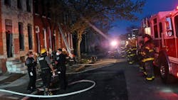 Baltimore City firefighters work the scene of an April 9 fatal fire. One person died and a firefighter was injured after a rowhome fire in the 1800 block of Presbury St. in the Sandtown- Winchester neighborhood. Baltimore City firefighters work the scene of an April 9 fatal fire. One person died and a firefighter was injured after a rowhome fire in the 1800 block of Presbury St. in the Sandtown- Winchester neighborhood.