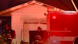 A Boise, ID, firefighter suffered minor injuries during a house fire that killed a woman and a dog Tuesday.