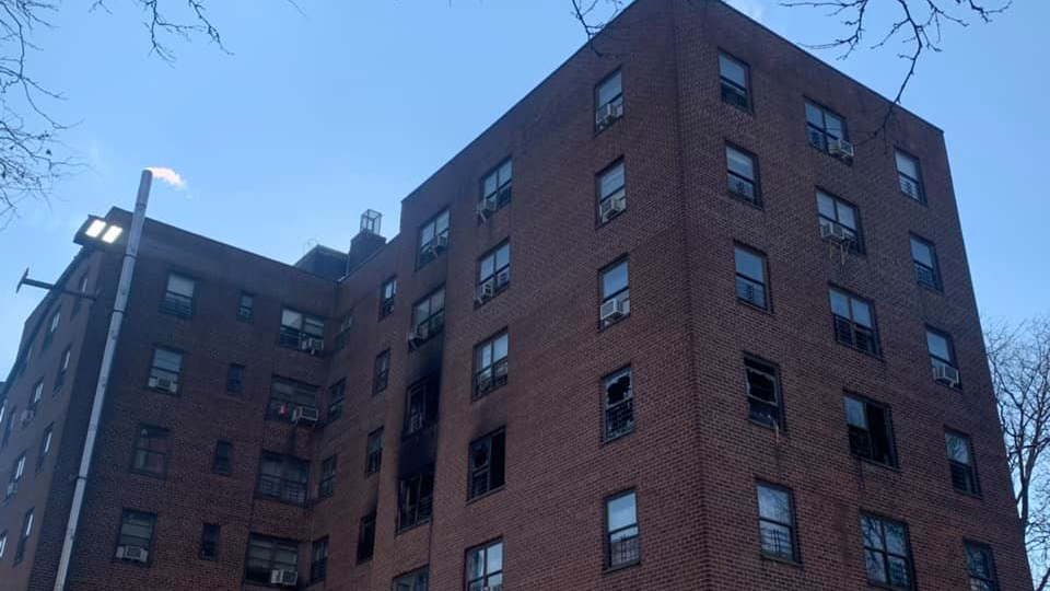 FDNY firefighters braved flames to rescue several crying residents trapped on the fourth floor of a burning seven-story building in the Bronx on Tuesday.