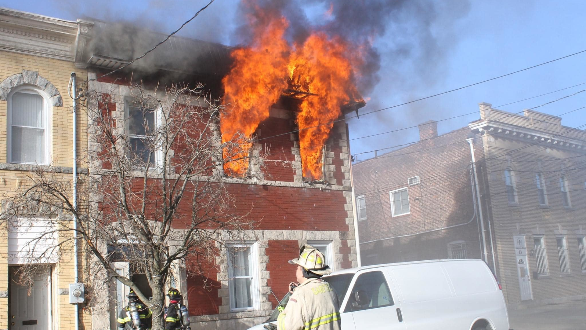 A firefighter was injured battling a fire that broke out Sunday at a multi-family building in Garfield, NJ.