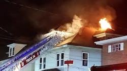 A firefighter collapsed on the roof of a burning house in Greensburg, PA, as crews worked to put out the residential fire early Friday. A firefighter collapsed on the roof of a burning house in Greensburg, PA, as crews worked to put out the residential fire early Friday.