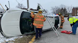Highland, IN, firefighters freed a woman who was trapped inside her vehicle after a hit-and-run crash with another vehicle Tuesday.