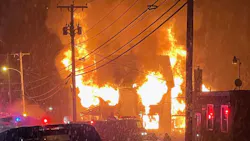 Firefighters from multiple departments battled a fire that destroyed a duplex in Livermore Falls, ME, on Tuesday.