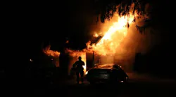 More than 50 firefighters battled a large fire that broke out at a one-story house in the Chapel Hill section of Middletown Township, NJ, late Sunday.
