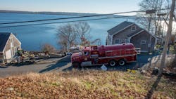As many as 35 firefighters from multiple departments battled a propane-fueled fire that destroyed three Prudence Island, RI, homes late Thursday. As many as 35 firefighters from multiple departments battled a propane-fueled fire that destroyed three Prudence Island, RI, homes late Thursday.