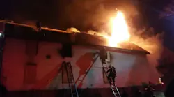 Worcester, MA, firefighters battle a three-alarm fire Tuesday that broke out at a vacant home for the second time in nearly four months.