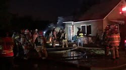 This screen capture from a Twitter video shows firefighters on the scene during a fire at a home in Harrison, PA, on Dec. 31, 2020. This screen capture from a Twitter video shows firefighters on the scene during a fire at a home in Harrison, PA, on Dec. 31, 2020.