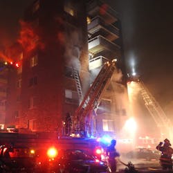 Roughly 80 firefighters battled a four-alarm blaze that broke out at an apartment complex outside of Harvard Square in Cambrdige, MA, on Tuesday.
