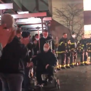 FDNY firefighter James Torsney of Ladder 172 left the hospital to applause from colleagues Tuesday night after being struck by a falling air condition during a Brooklyn fire the previous day.