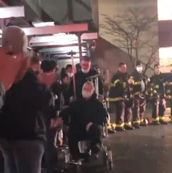 FDNY firefighter James Torsney of Ladder 172 left the hospital to applause from colleagues Tuesday night after being struck by a falling air condition during a Brooklyn fire the previous day.