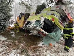 The pumper rolled over while responding to an EMS call on a snow-covered road.