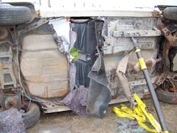 This large opening, where the rear-seat passengers normally put their feet, actually is a very good place to breech through the floorboard. It is a relatively thin area ahead of the fuel tank and just behind the front seats. This large opening, where the rear-seat passengers normally put their feet, actually is a very good place to breech through the floorboard. It is a relatively thin area ahead of the fuel tank and just behind the front seats.
